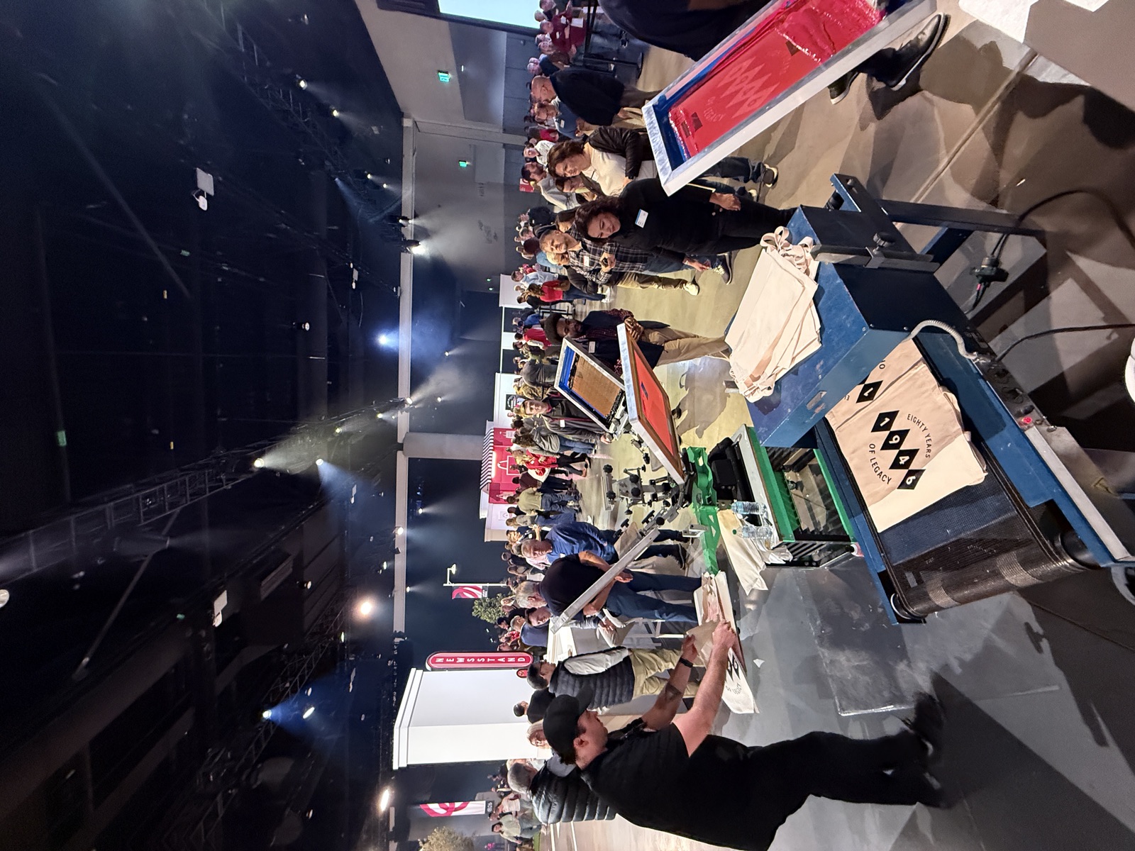 Guests lined up at a live Merch Troop activation for Live T-Shirts Printing